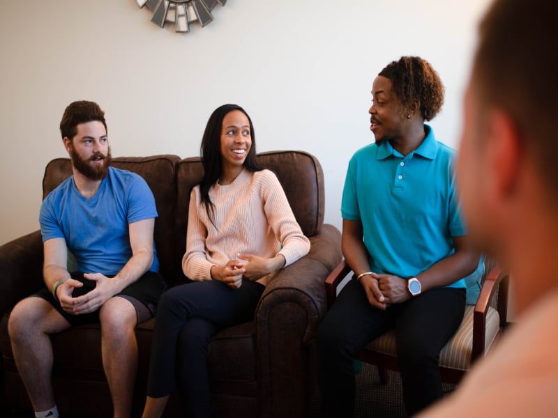 Patients talking in a group session