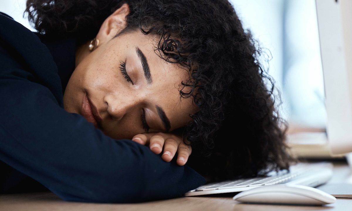 Sleeping, face and business woman burnout from finance portfolio work, stock market database or inv.